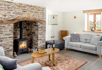 Cosy up in front of the flicker and crackle of the woodburner on a chilly evening.