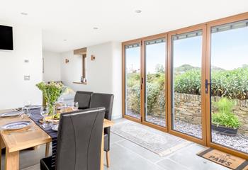 Open the bi-fold doors and let the fresh air run through the cottage.