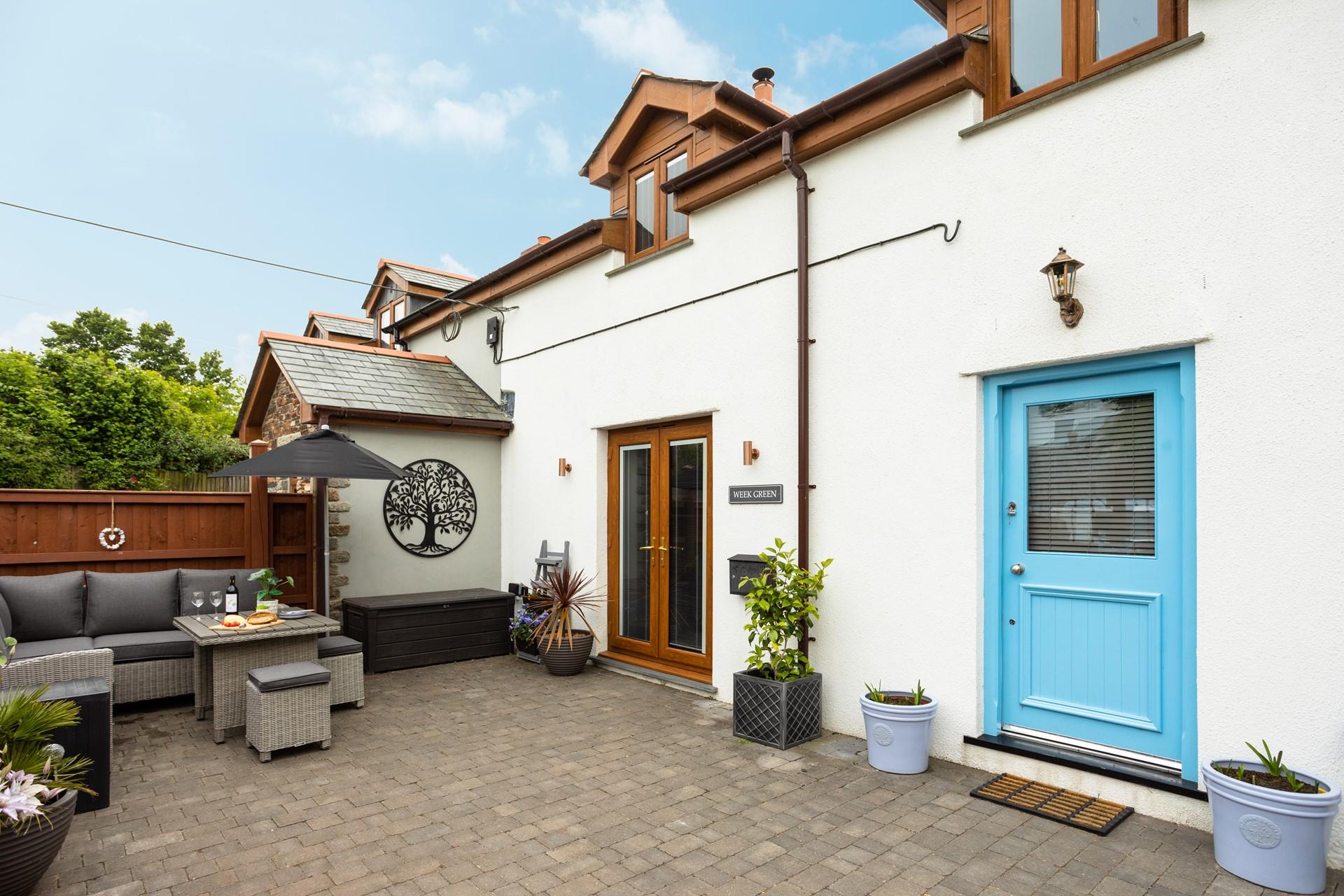The courtyard area has rattan furniture perfect for sipping wine and tucking into nibbles as the sun comes down.