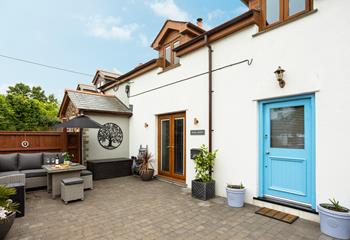 The courtyard area has rattan furniture perfect for sipping wine and tucking into nibbles as the sun comes down.