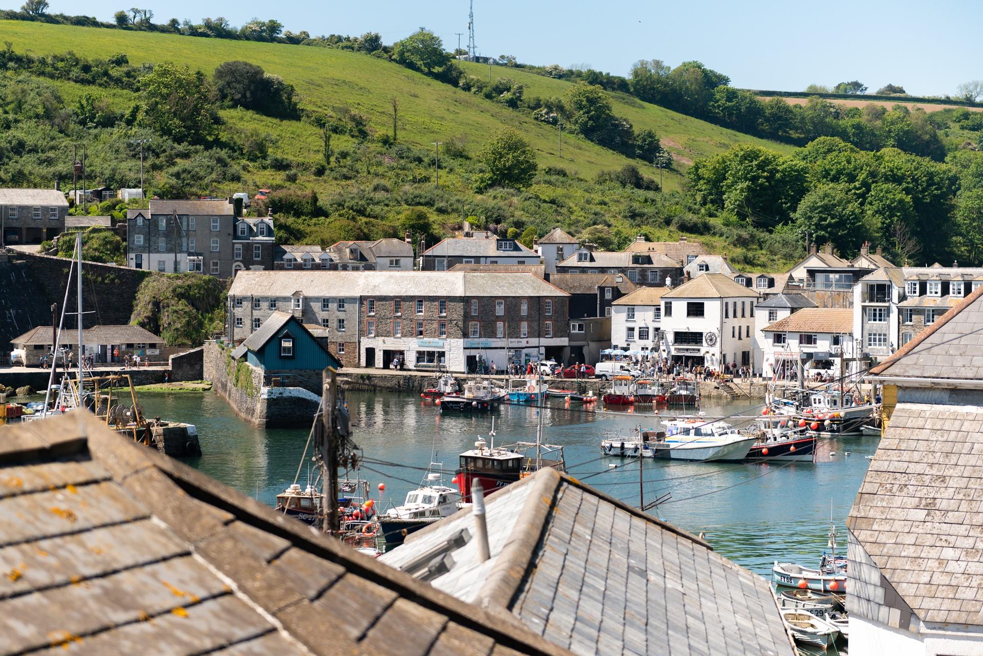 The harbour town of Mevagissey features quaint local businesses.