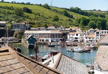 The harbour town of Mevagissey features quaint local businesses.