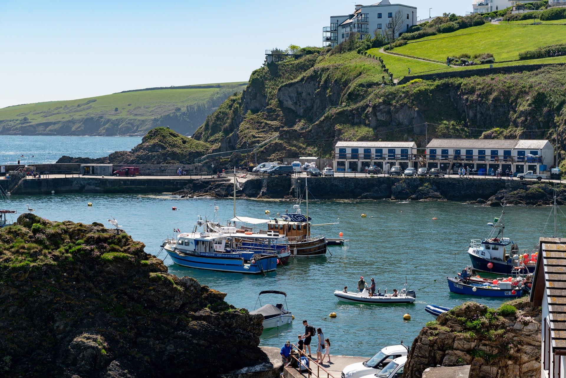 Watch the sea glisten in the sun.