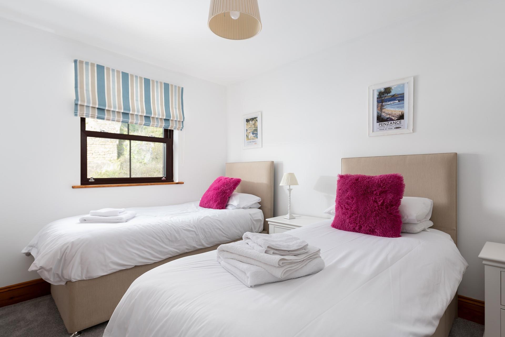 Bedroom 1 has twin beds perfect for adults or children.