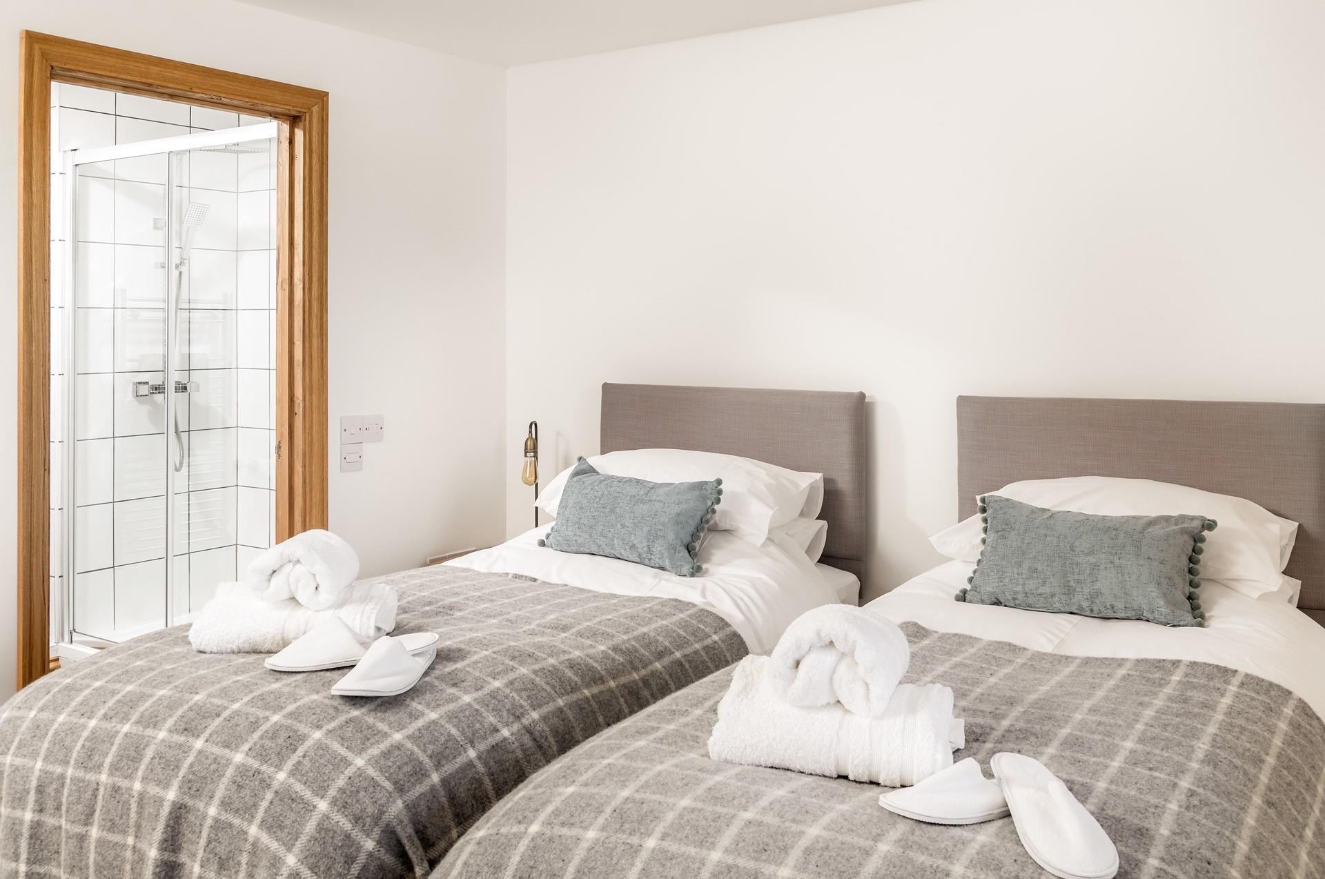 Bedroom 2 has a convenient en suite shower room, perfect for an invigorating morning shower.