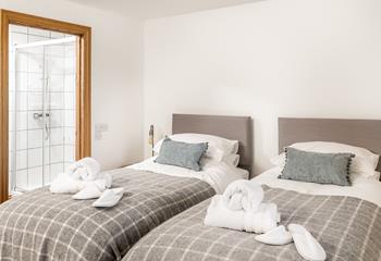 Bedroom 2 has a convenient en suite shower room, perfect for an invigorating morning shower.