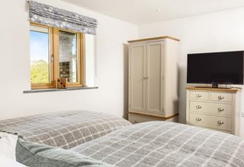 Bedroom 2 has a wardrobe, a chest of five drawers, and plenty of storage for holiday clothes.