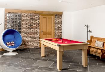 Enjoy a game of pool in the evening to unwind from a busy day.