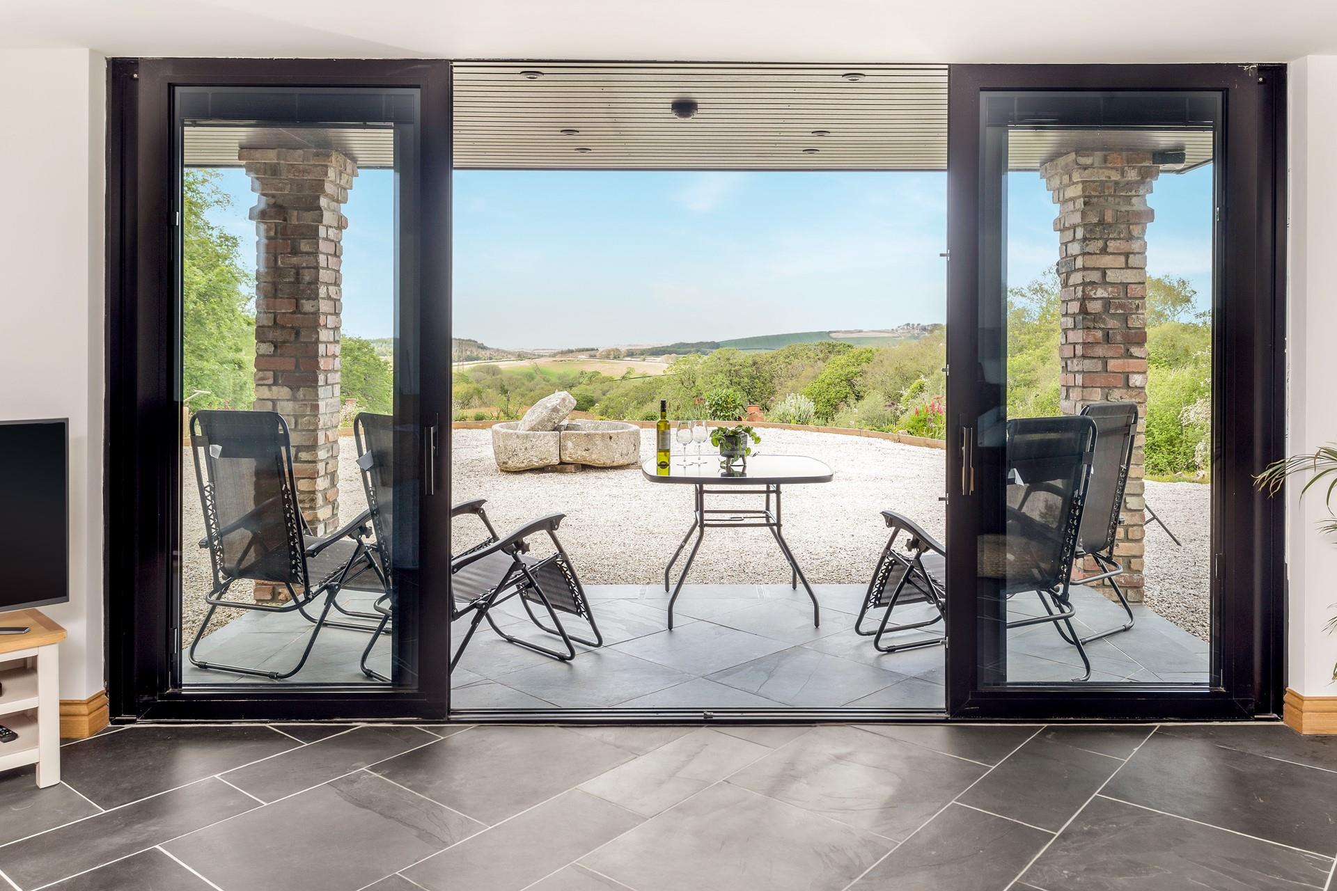 Relax and unwind with a glass of wine as you watch the sun come down.