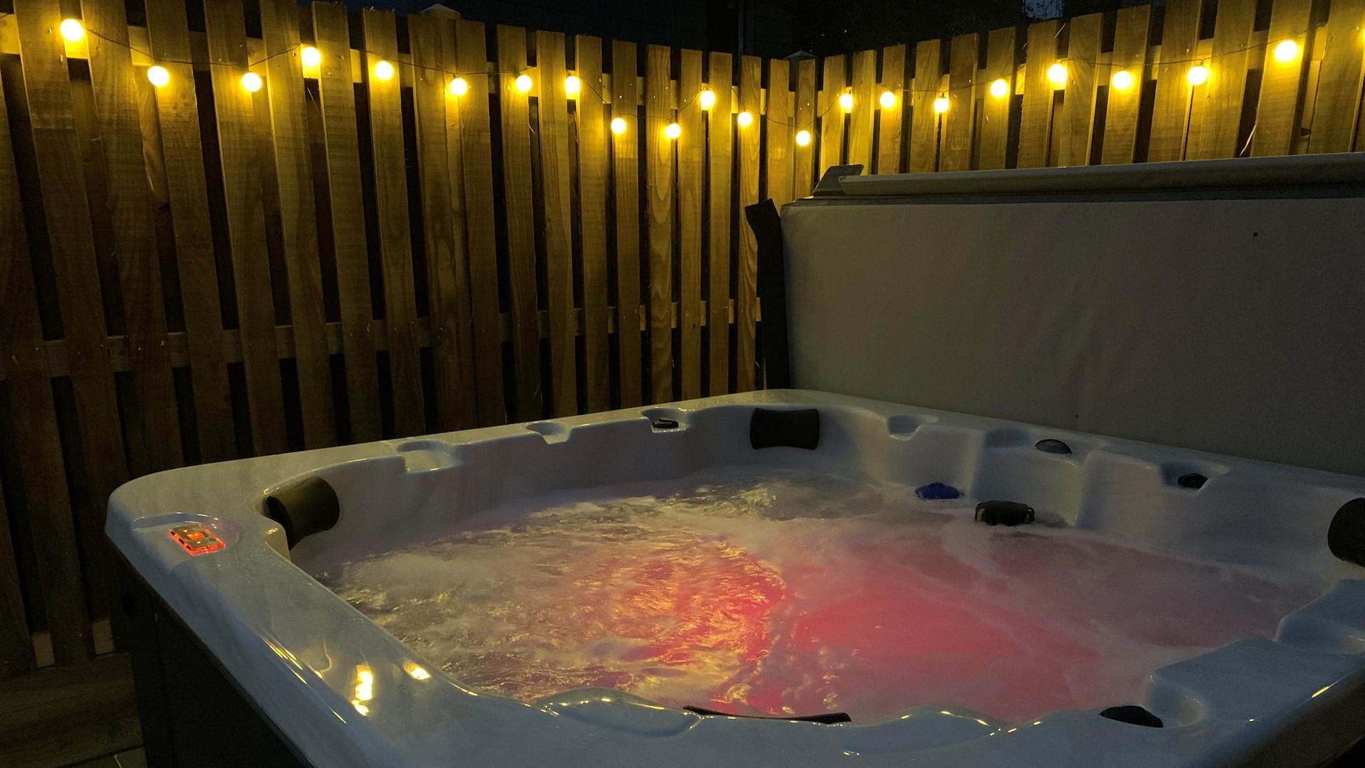 Indulge in a soak in the bubbling hot tub as the sun goes down.