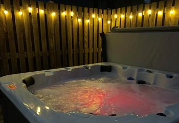 Indulge in a soak in the bubbling hot tub as the sun goes down.