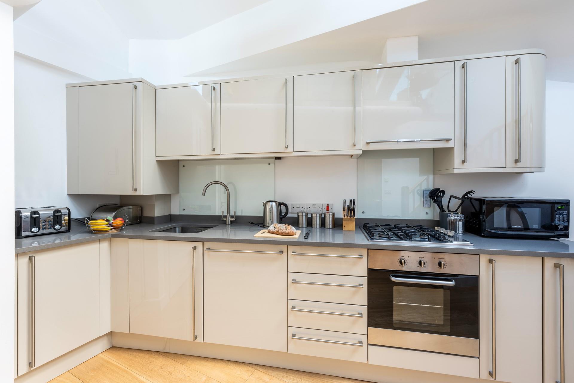 Though compact, the kitchen is fabulously well-equipped.