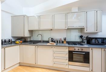 Though compact, the kitchen is fabulously well-equipped.