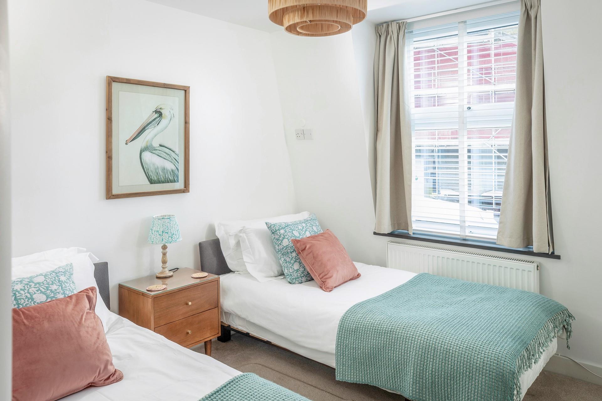 Twin beds are ideal for children or adults.