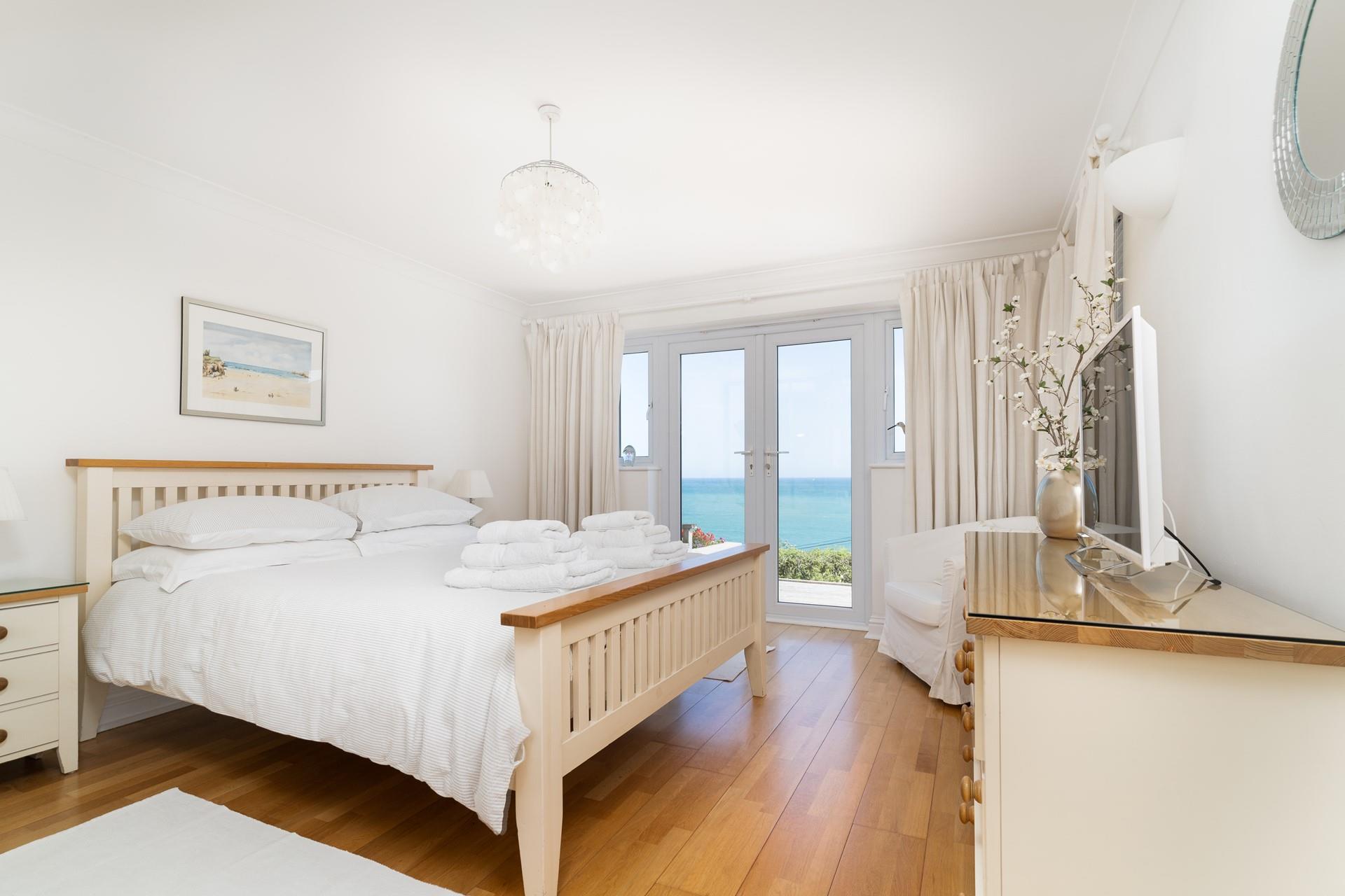 Bedroom 1 offers a comfortable night's sleep with a king size bed. 