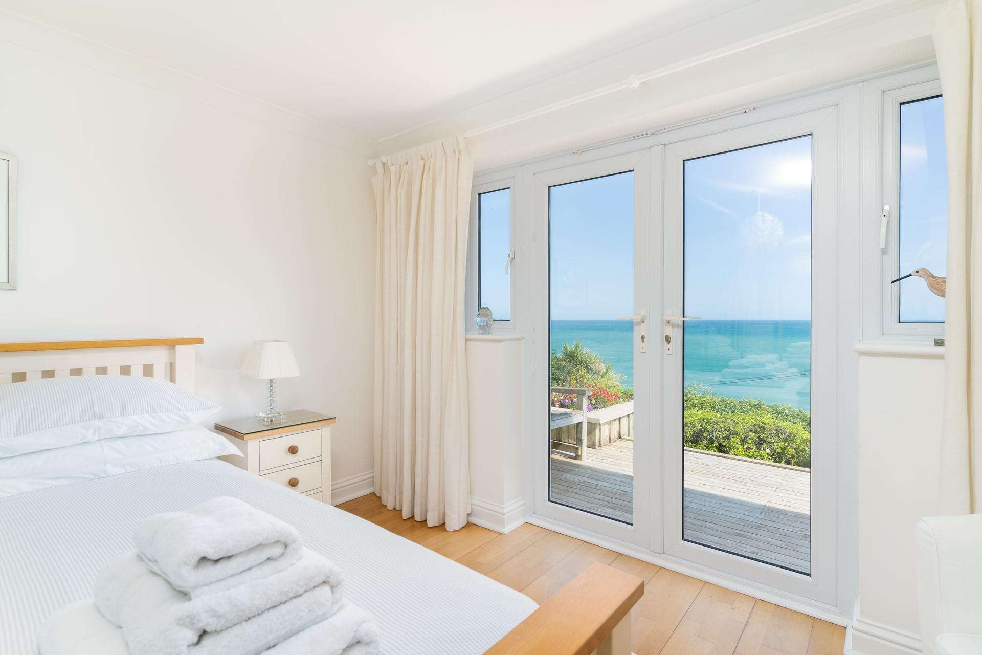Wake up to stunning views reaching out beyond Godrevy Lighthouse. 