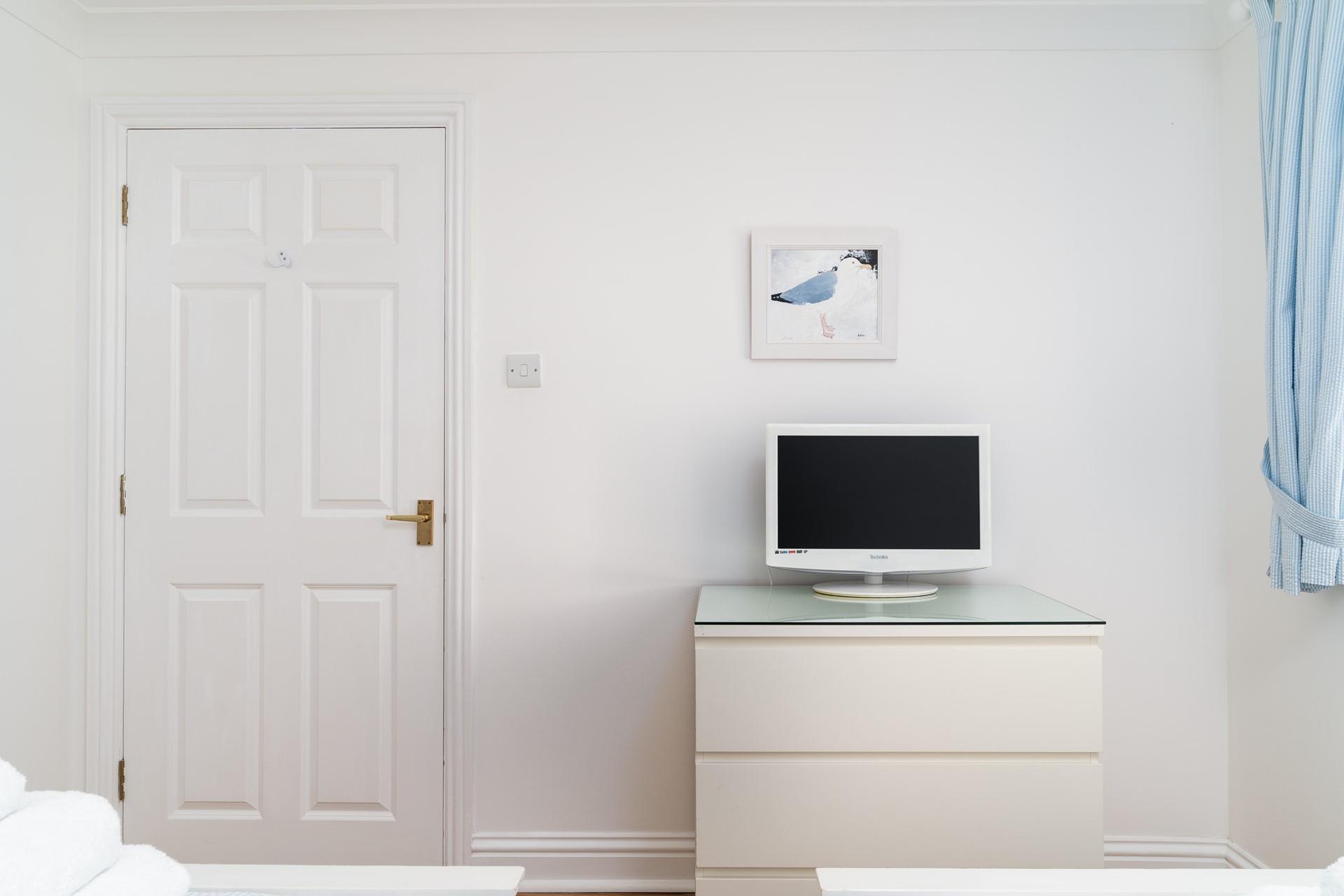 Relax in the evenings with a good film on the TV.