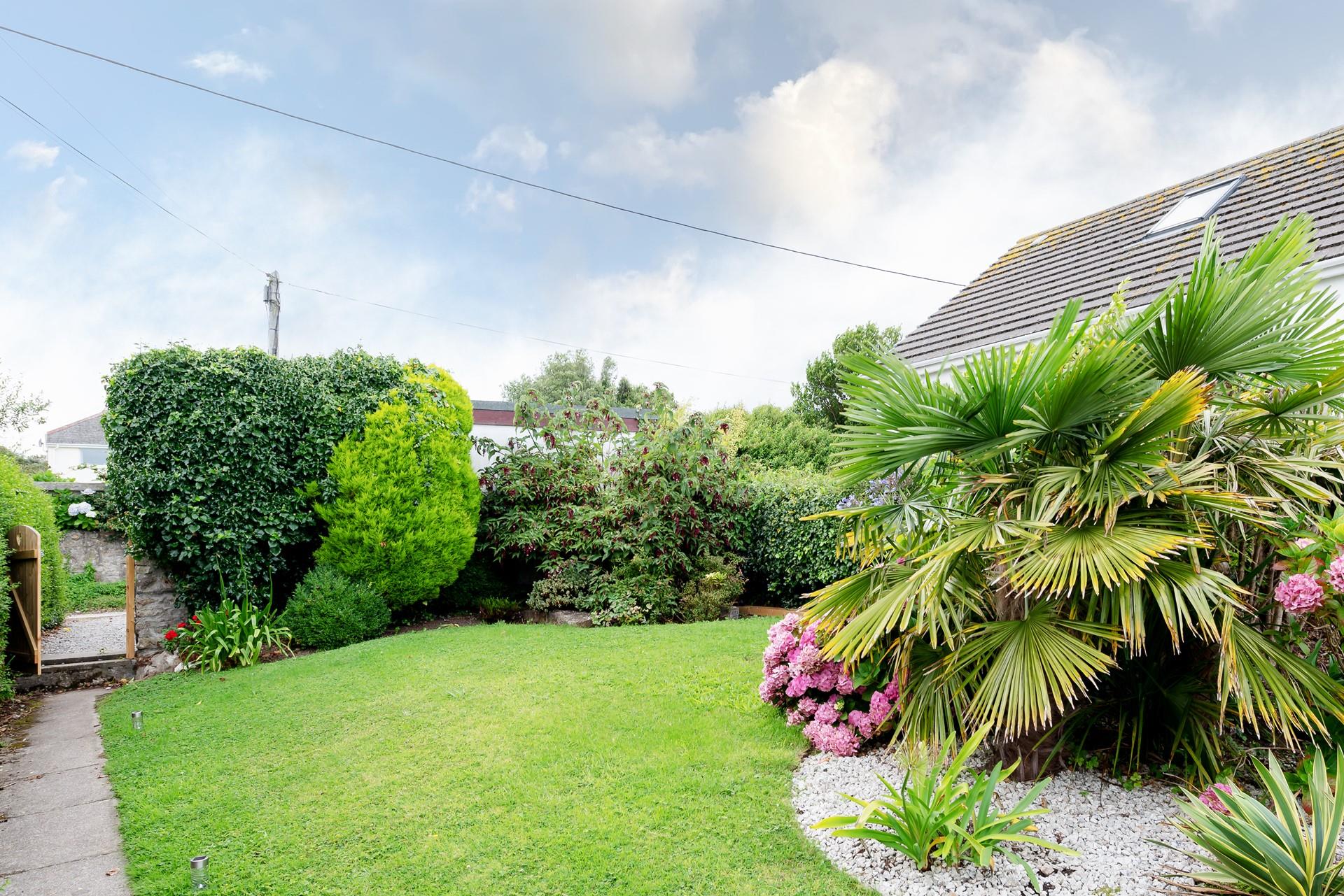 The garden has plenty of space for the little ones to play.