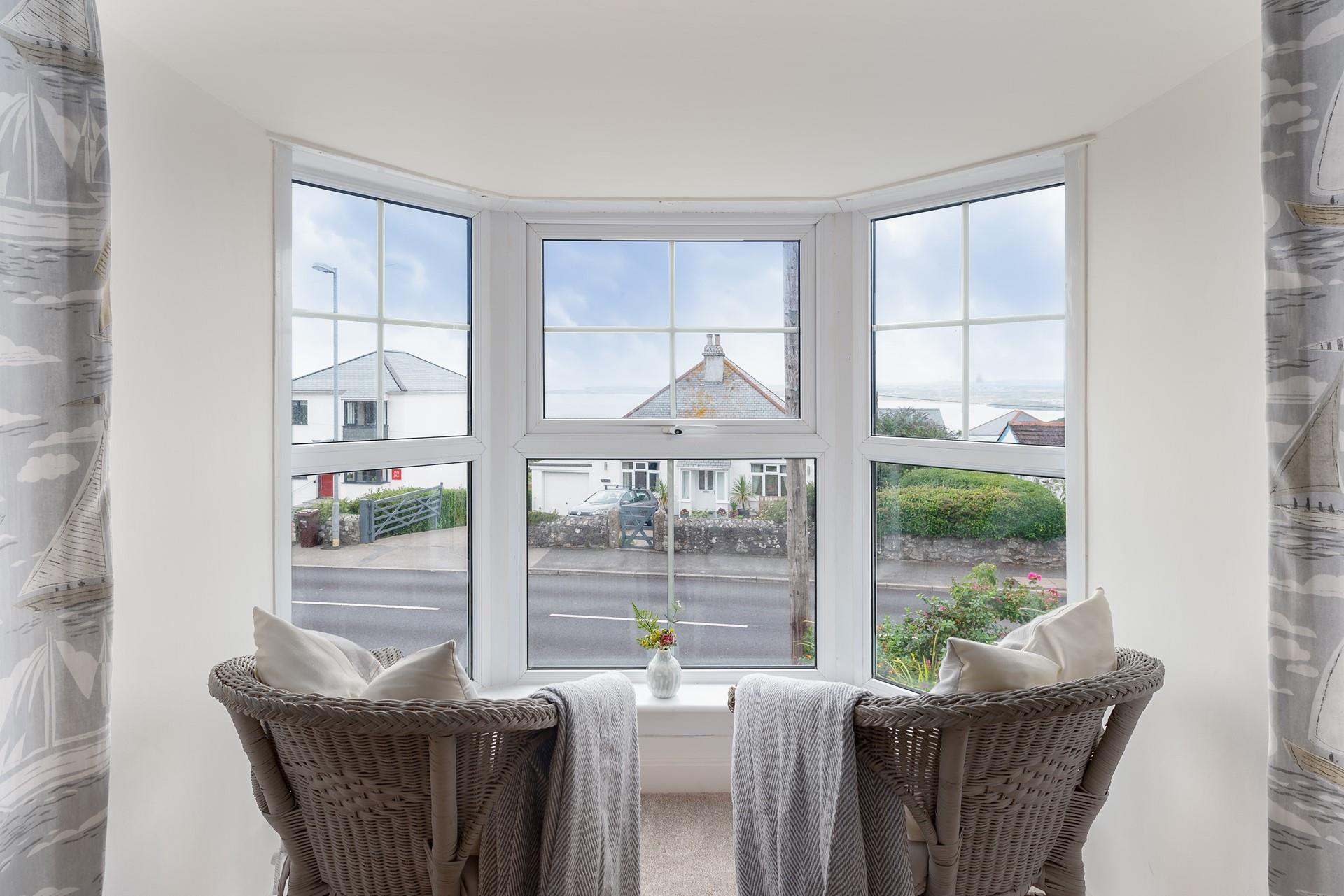 Take a quiet moment to sit in the window seat with your favourite book.