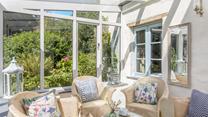 The conservatory is the perfect place to admire the wildflower garden while you enjoy a morning cuppa.