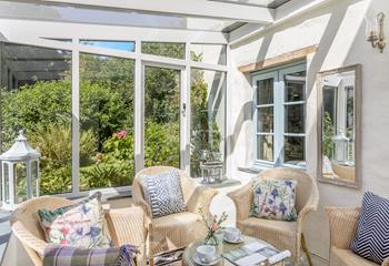 The conservatory is the perfect place to admire the wildflower garden while you enjoy a morning cuppa.