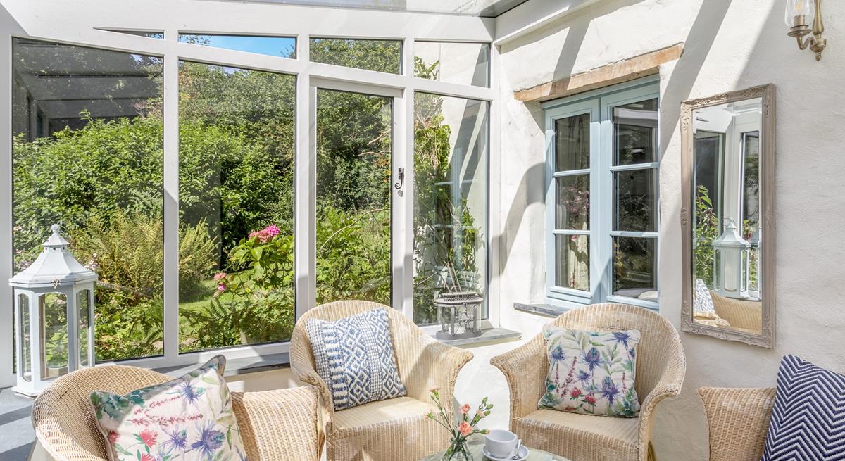 The conservatory is the perfect place to admire the wildflower garden while you enjoy a morning cuppa.