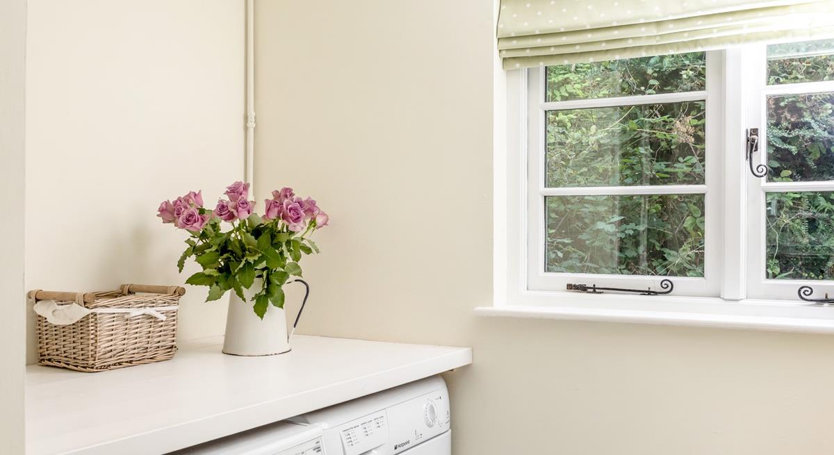 A handy utility room is great for sandy flip-flops or muddy wellies.