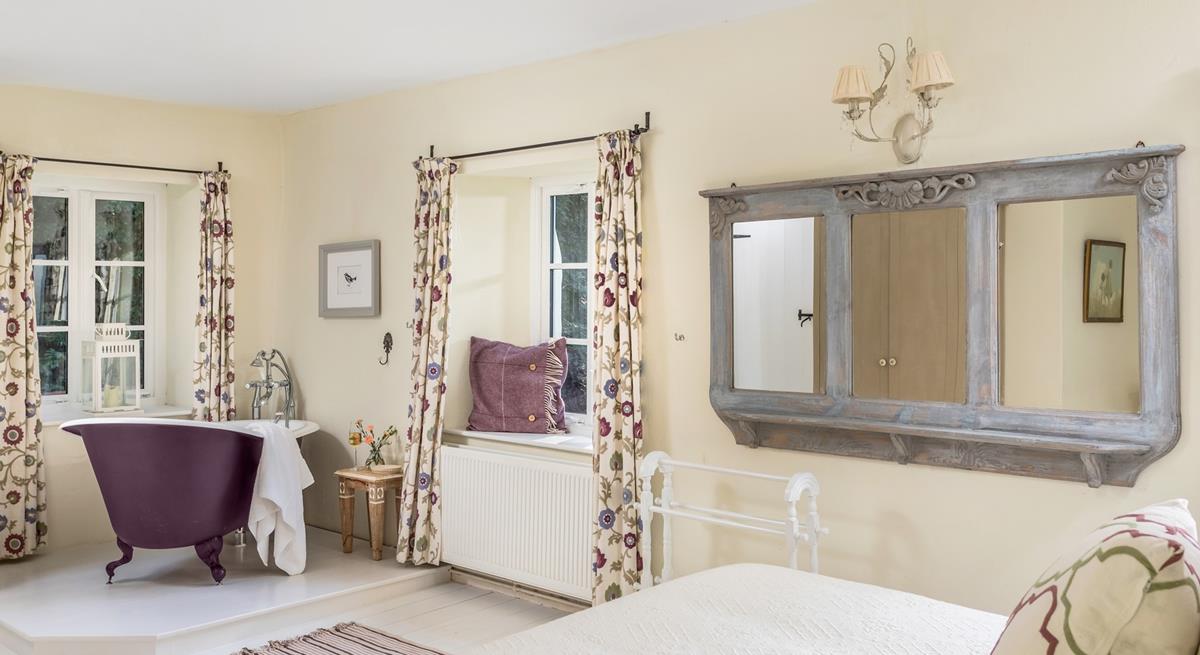 Soak in the roll-top bath after a day of exploring the South West Coast Path.