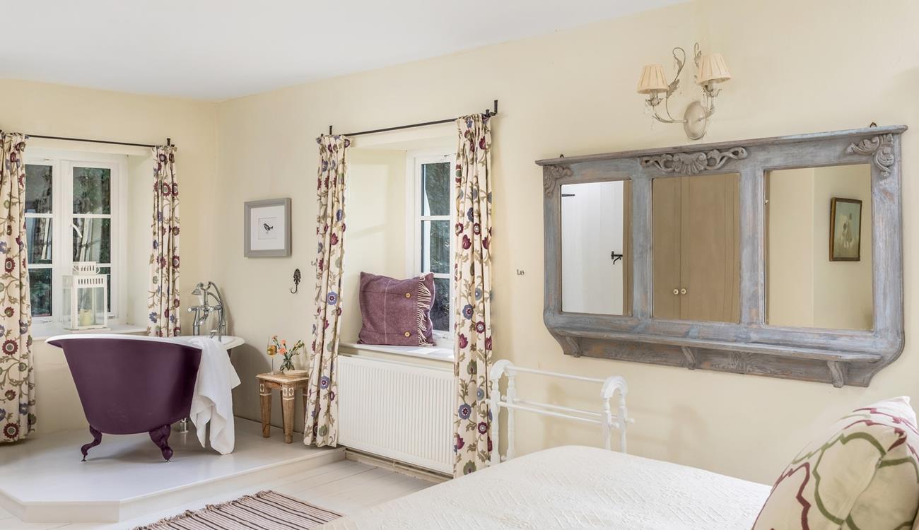 Soak in the roll-top bath after a day of exploring the South West Coast Path.