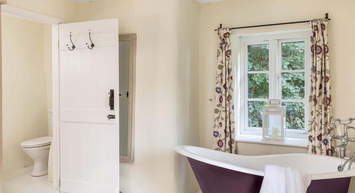 Watch the trees dancing in the breeze whilst indulging in a relaxing bath. 