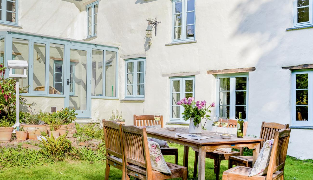 Lazy lunches can be spent sipping wine in the picturesque garden.
