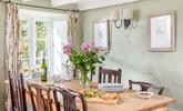 Come together at your large dining table for a wholesome family dinner. - Thumbnail Image