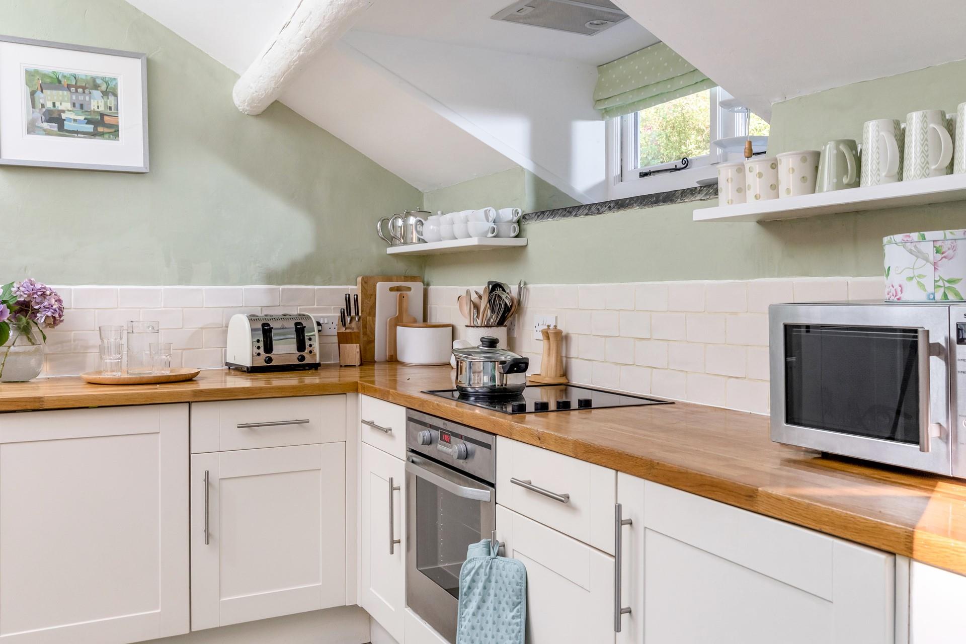 The kitchen has all you need to rustle up a delicious hearty dinner after a day exploring the spectacular walks on your doorstep.