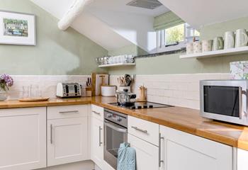 The kitchen has all you need to rustle up a delicious hearty dinner after a day exploring the spectacular walks on your doorstep.