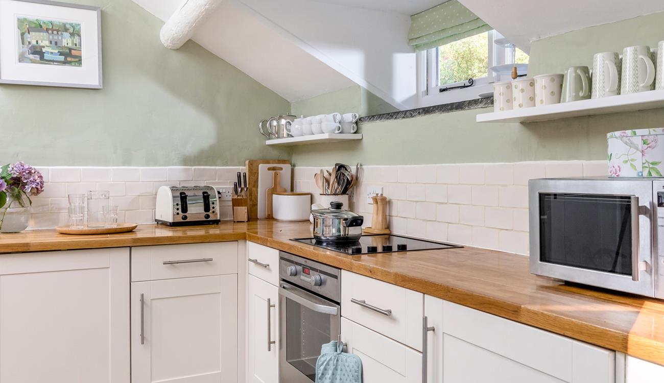 The kitchen has all you need to rustle up a delicious hearty dinner after a day exploring the spectacular walks on your doorstep.