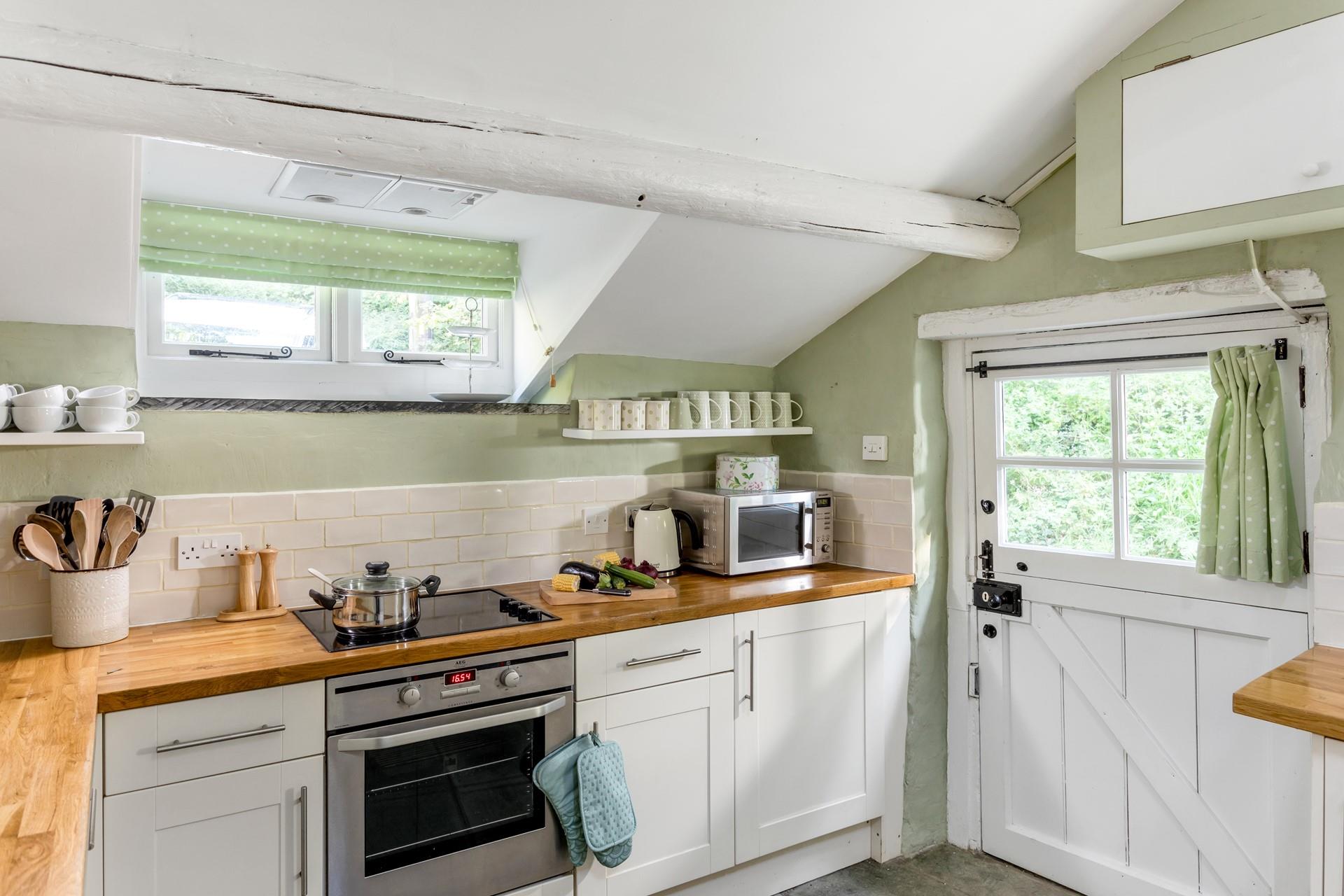 Cooking will be a delight in the countryside kitchen.