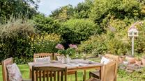 Grab some blankets and head outside for a long evening of chatting and sipping wine in the garden.