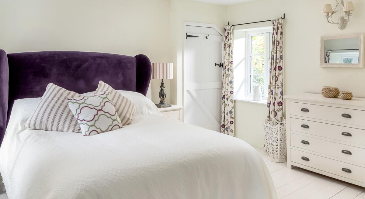 The main bedroom has a luxurious king size bed for slow mornings.