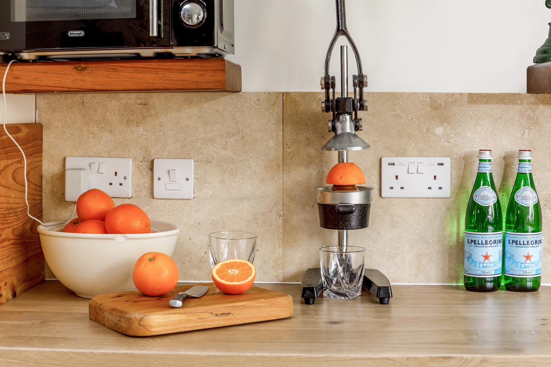 Sip fresh orange juice in the morning over breakfast.