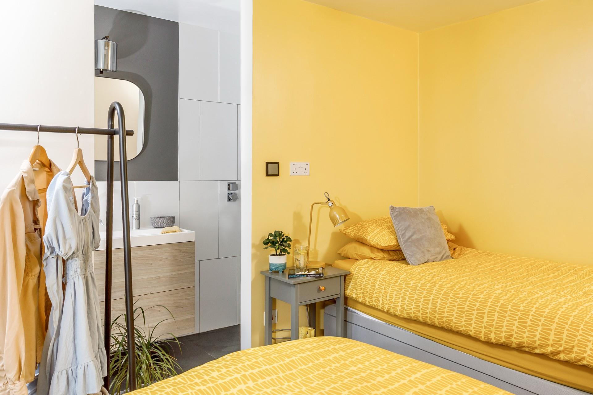 Climb out of bed and into the en suite to get ready for the day.