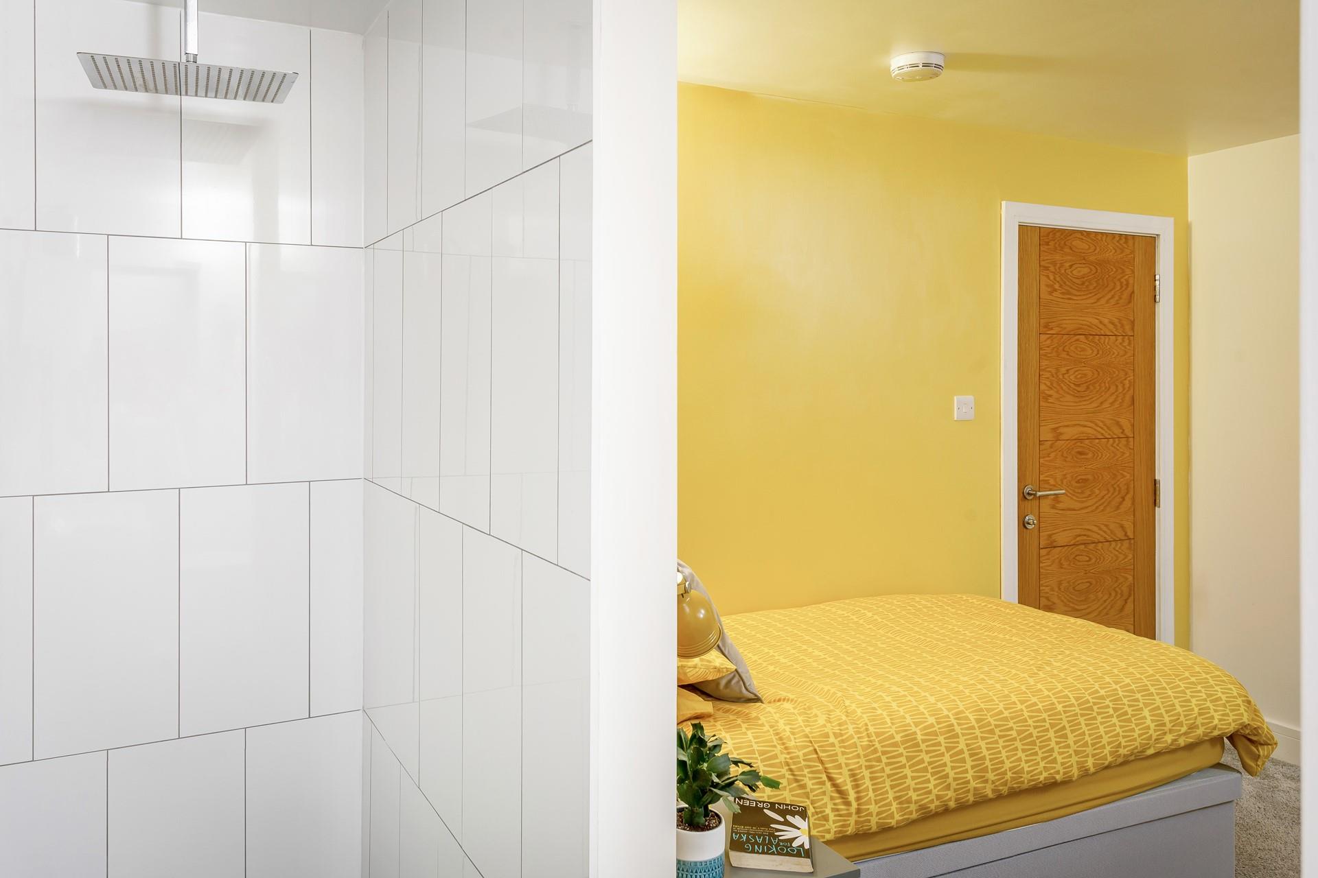 Start the day with an invigorating shower under the rain head.