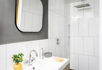 The en suite is modern and the perfect space to get ready.