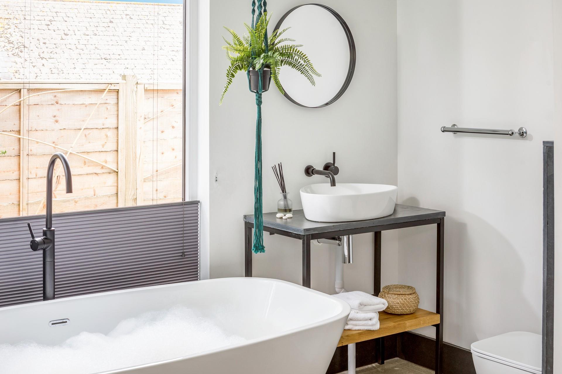 Winter days can be spent in a bubble bath while the wind whistles outside.