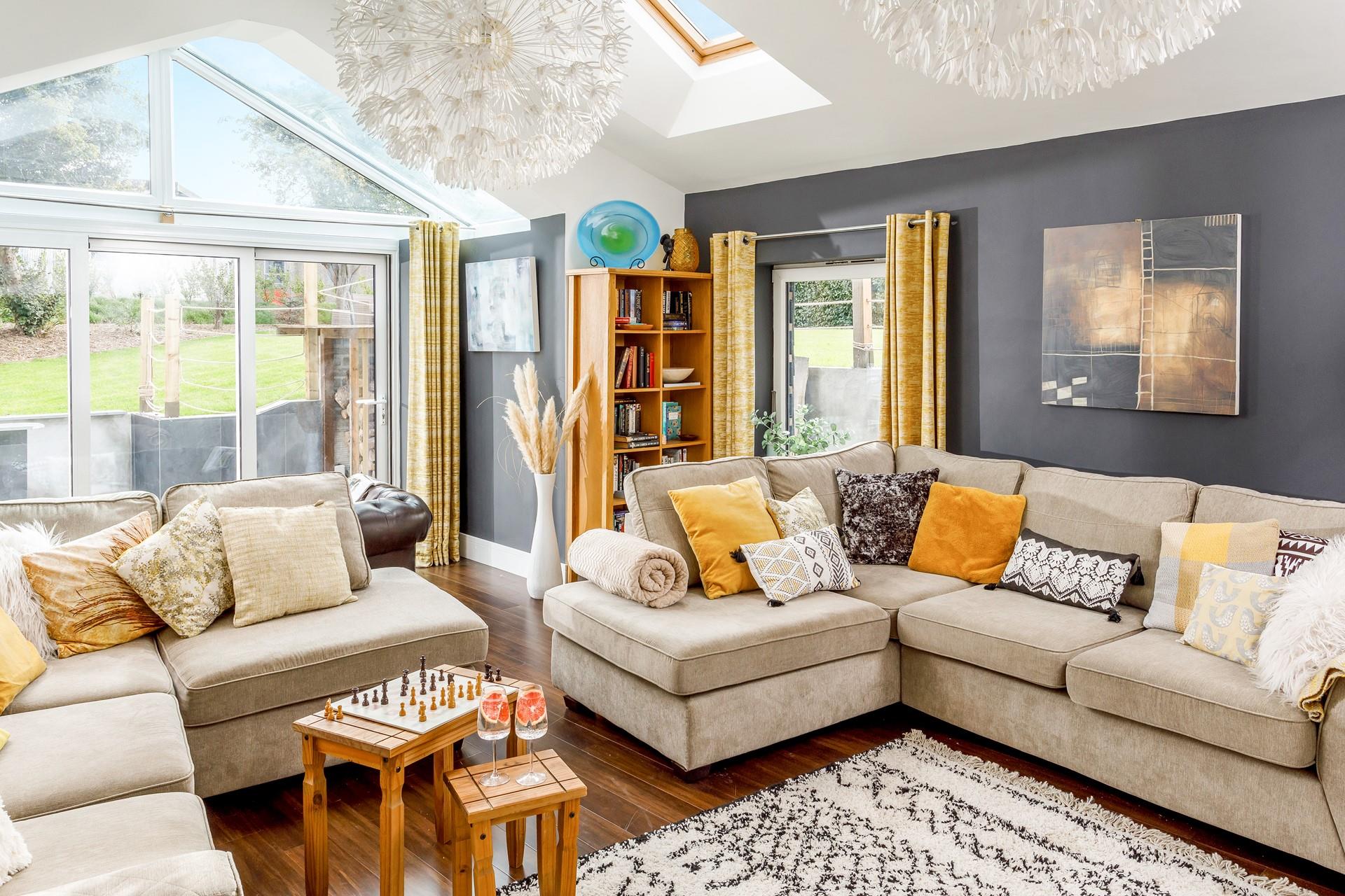 Stylish and modern, the sitting room provides a space to spend quality time as a family.