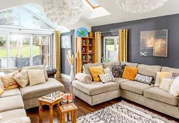 Stylish and modern, the sitting room provides a space to spend quality time as a family.