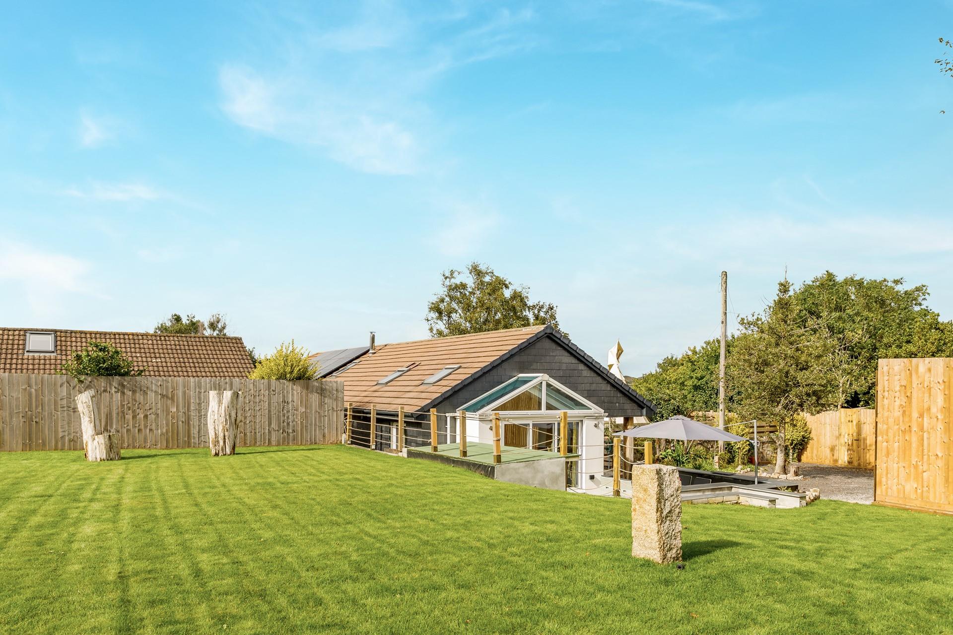 The large garden is perfect for games or just simply relaxing with a cold drink.