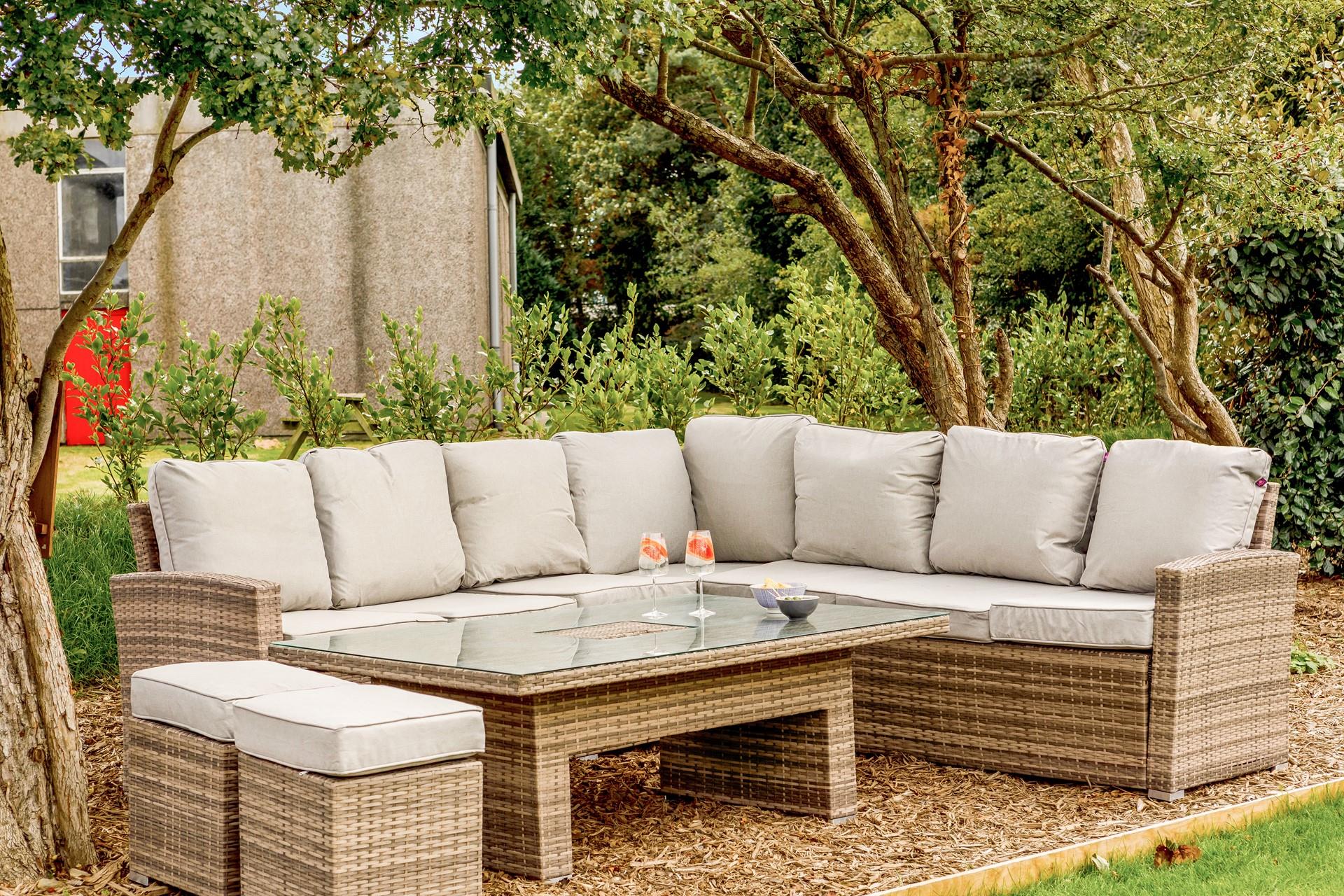 Relax and unwind on the rattan furniture with a cold drink.