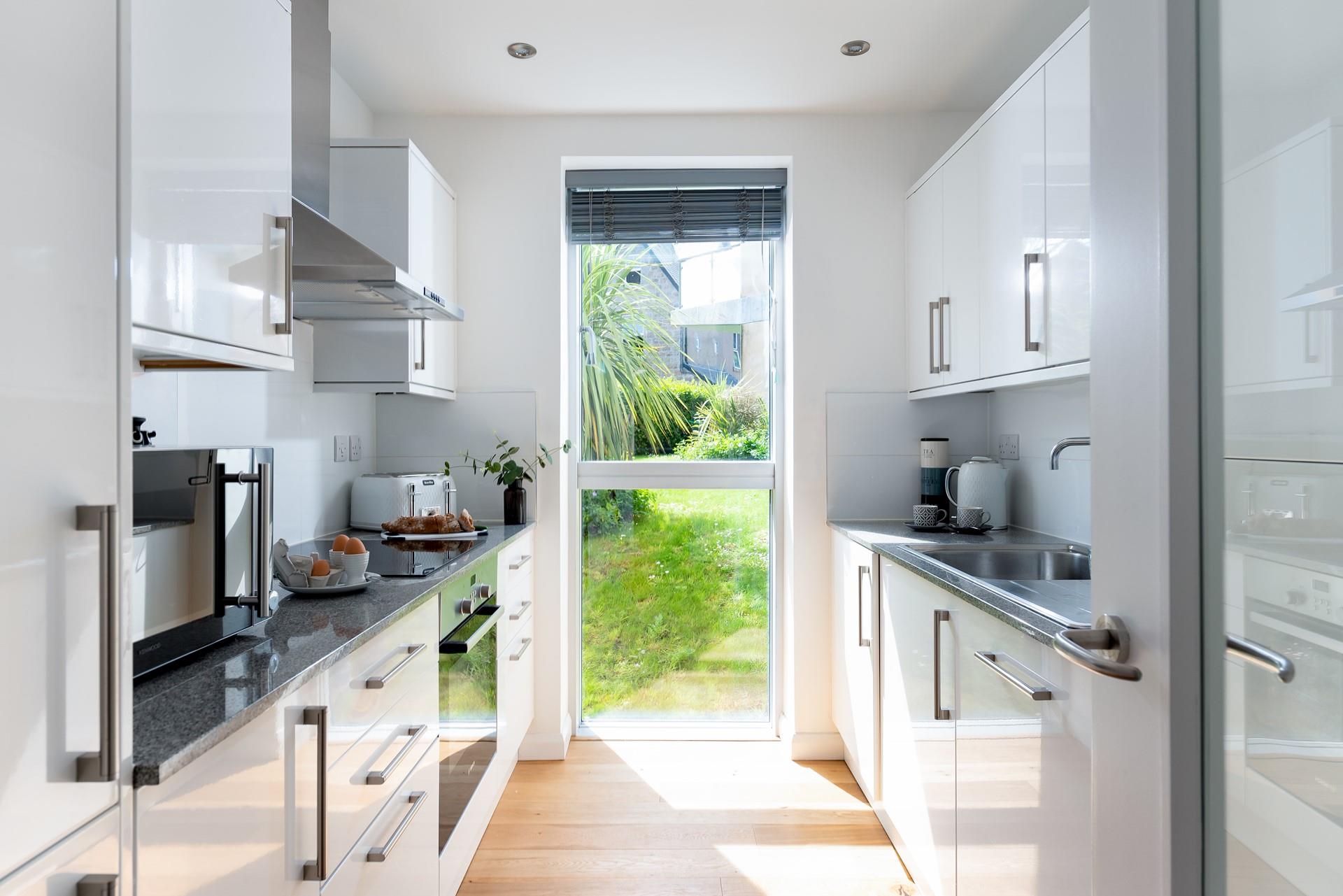 The kitchen is well-equipped to cook family meals, or why not venture into town for meals? You are on holiday after all!