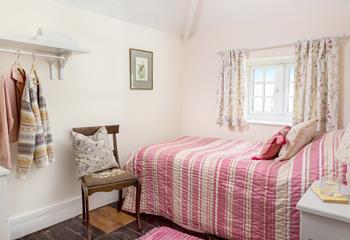 Bedroom 3 has a single bed perfect for young adults or children.