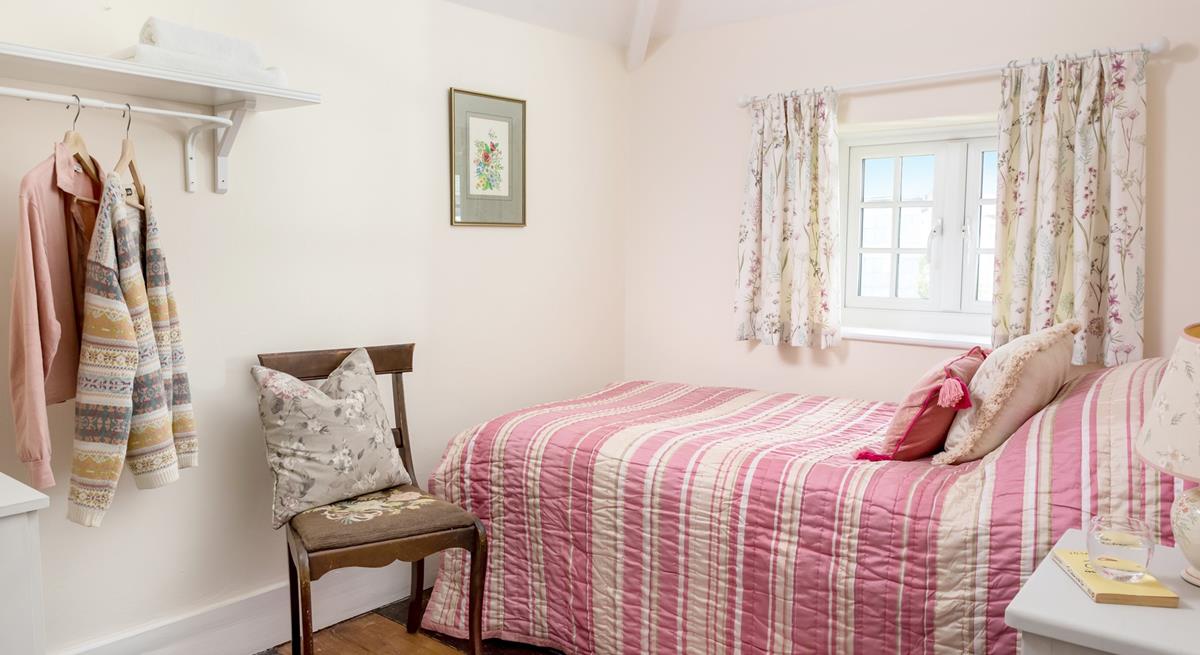 Bedroom 3 has a single bed perfect for young adults or children.
